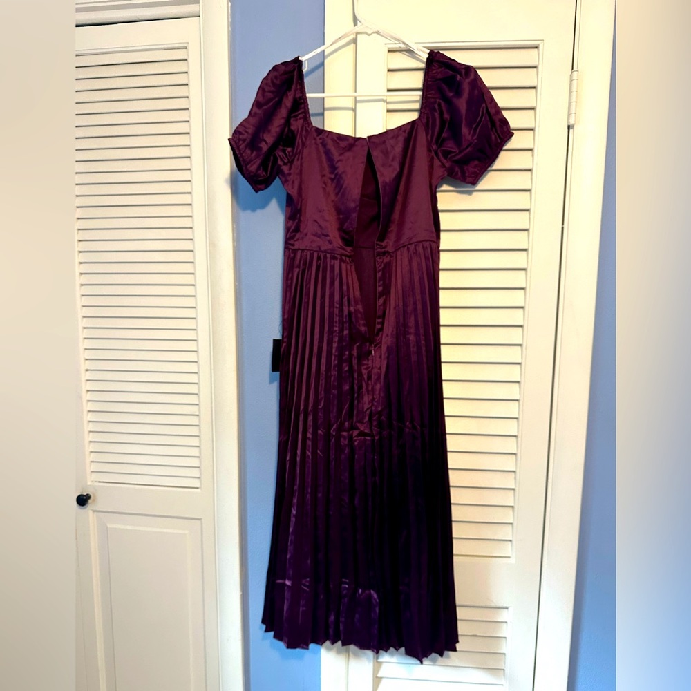Bought this dress for a wedding and went a different direction!